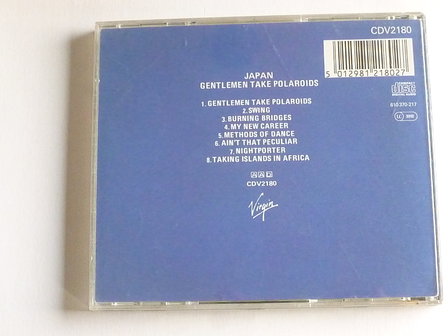 Japan - Gentlemen take polaroids