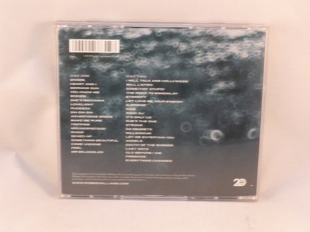 Robbie Williams - In and out of Consciousness / Greatest Hits 1990-2010