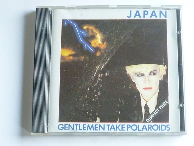 Japan - Gentlemen take polaroids