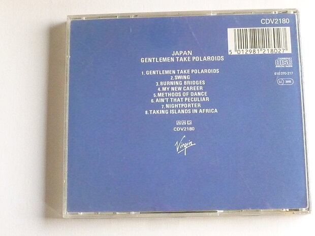 Japan - Gentlemen take polaroids