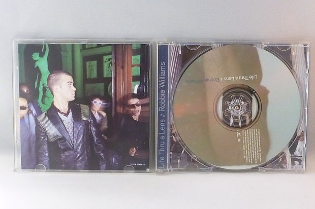 Robbie Williams - Life thru a Lens